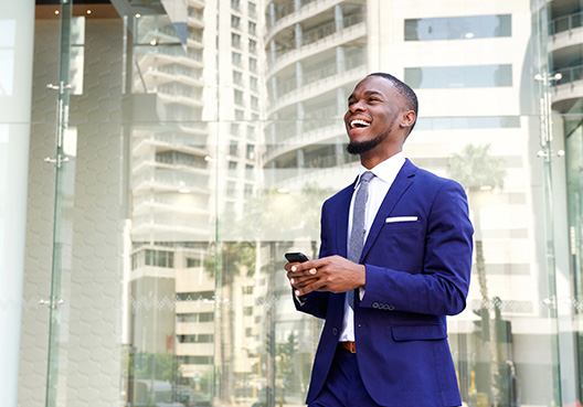 Man standing in front of a building