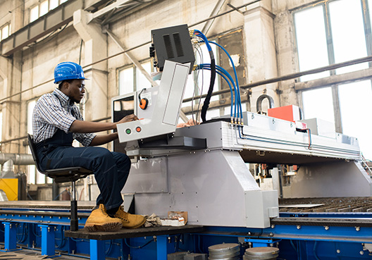 man working on machine