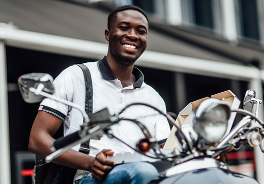 guy sitting on motorcycle