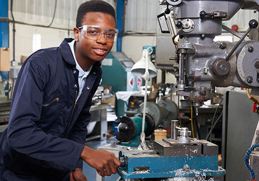 man standing by equipment