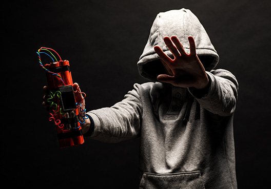 man holding a bomb with his hands outstretched