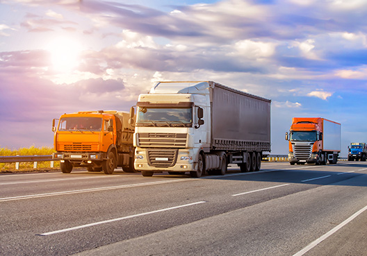 multiple trucks on a road