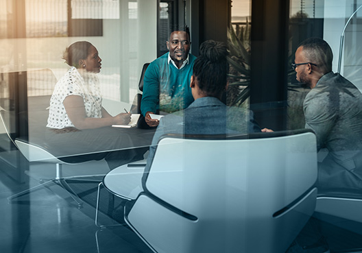 people sitting in a conference room