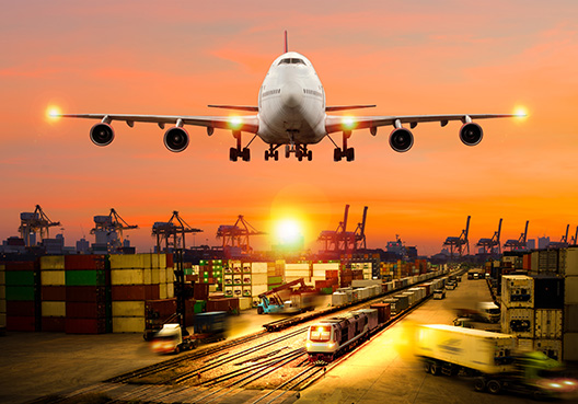 plane flying over cargo bay